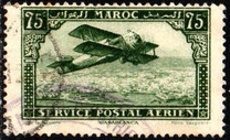 [Airmail - Plane over Casablanca - Inscribed MAROC above, POSTAL SERVICE AERIEN below, type AF]