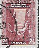 [Inscription "TÜRKIYE CÜMHURIYETI" - "Ü" in "CÜMHURIYETI", type JW]