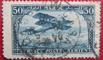 [Airmail - Plane over Casablanca - Inscribed MAROC above, POSTAL SERVICE AERIEN below, type AD]