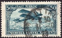 [Airmail - Plane over Casablanca - Inscribed MAROC above, POSTAL SERVICE AERIEN below, type AD]