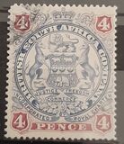 [Coat of Arms - End of Scroll Curled between Legs of Supporting Animals, tip J4]