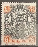 [Coat of Arms - End of Scroll Curled between Legs of Supporting Animals, tip J7]